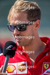 Sebastian Vettel (GER) Ferrari. 23.08.2015. Formula 1 World Championship, Rd 13, Belgian Grand Prix, Spa Francorchamps, Belgium, Race Day.