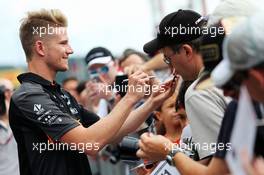 Nico Hulkenberg (GER) Sahara Force India F1 signs autographs for the fans. 20.08.2015. Formula 1 World Championship, Rd 11, Belgian Grand Prix, Spa Francorchamps, Belgium, Preparation Day.