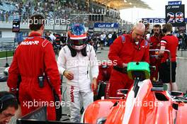 Will Stevens (GBR) Manor Marussia F1 Team on the grid. 19.04.2015. Formula 1 World Championship, Rd 4, Bahrain Grand Prix, Sakhir, Bahrain, Race Day.