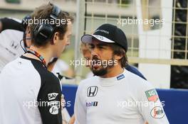 Fernando Alonso (ESP) McLaren on the grid. 19.04.2015. Formula 1 World Championship, Rd 4, Bahrain Grand Prix, Sakhir, Bahrain, Race Day.