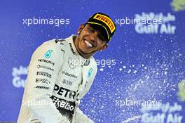 Race winner Lewis Hamilton (GBR) Mercedes AMG F1 celebrates on the podium. 19.04.2015. Formula 1 World Championship, Rd 4, Bahrain Grand Prix, Sakhir, Bahrain, Race Day.