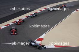 Lewis Hamilton (GBR) Mercedes AMG F1 W06 leads at the start of the race. 19.04.2015. Formula 1 World Championship, Rd 4, Bahrain Grand Prix, Sakhir, Bahrain, Race Day.