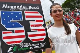 Grid girl for Alexander Rossi (USA) Manor Marussia F1 Team. 15.11.2015. Formula 1 World Championship, Rd 18, Brazilian Grand Prix, Sao Paulo, Brazil, Race Day.