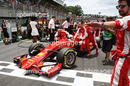 Sebastian Vettel (GER) Ferrari SF15-T on the grid. 15.11.2015. Formula 1 World Championship, Rd 18, Brazilian Grand Prix, Sao Paulo, Brazil, Race Day.