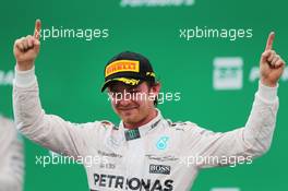 Race winner Nico Rosberg (GER) Mercedes AMG F1 celebrates on the podium. 15.11.2015. Formula 1 World Championship, Rd 18, Brazilian Grand Prix, Sao Paulo, Brazil, Race Day.