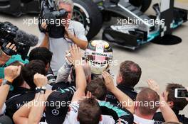 Lewis Hamilton (GBR) Mercedes AMG F1 celebrates his second position with the team in parc ferme. 15.11.2015. Formula 1 World Championship, Rd 18, Brazilian Grand Prix, Sao Paulo, Brazil, Race Day.