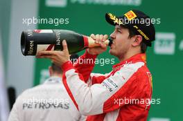 Sebastian Vettel (GER) Ferrari celebrates his third position on the podium. 15.11.2015. Formula 1 World Championship, Rd 18, Brazilian Grand Prix, Sao Paulo, Brazil, Race Day.