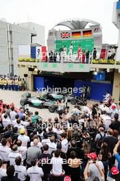 The podium (L to R): Lewis Hamilton (GBR) Mercedes AMG F1, second; Nico Rosberg (GER) Mercedes AMG F1, race winner; Sebastian Vettel (GER) Ferrari, third. 15.11.2015. Formula 1 World Championship, Rd 18, Brazilian Grand Prix, Sao Paulo, Brazil, Race Day.