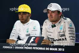 (L to R): Lewis Hamilton (GBR) Mercedes AMG F1 and team mate Nico Rosberg (GER) Mercedes AMG F1 in the FIA Press Conference. 15.11.2015. Formula 1 World Championship, Rd 18, Brazilian Grand Prix, Sao Paulo, Brazil, Race Day.