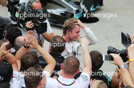 Race winner Nico Rosberg (GER) Mercedes AMG F1 celebrates in parc ferme with the team. 15.11.2015. Formula 1 World Championship, Rd 18, Brazilian Grand Prix, Sao Paulo, Brazil, Race Day.