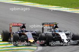 Sergio Perez (MEX) Sahara Force India F1 VJM08 and Max Verstappen (NLD) Scuderia Toro Rosso STR10 battle for position. 15.11.2015. Formula 1 World Championship, Rd 18, Brazilian Grand Prix, Sao Paulo, Brazil, Race Day.