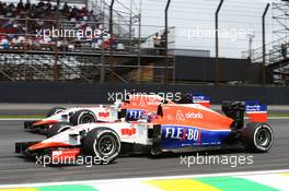 Alexander Rossi (USA) Manor Marussia F1 Team and team mate Will Stevens (GBR) Manor Marussia F1 Team. 15.11.2015. Formula 1 World Championship, Rd 18, Brazilian Grand Prix, Sao Paulo, Brazil, Race Day.