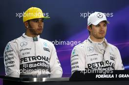 (L to R): Lewis Hamilton (GBR) Mercedes AMG F1 with team mate Nico Rosberg (GER) Mercedes AMG F1 in the post qualifying FIA Press Conference. 14.11.2015. Formula 1 World Championship, Rd 18, Brazilian Grand Prix, Sao Paulo, Brazil, Qualifying Day.