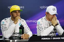(L to R): Lewis Hamilton (GBR) Mercedes AMG F1 with team mate Nico Rosberg (GER) Mercedes AMG F1 in the post qualifying FIA Press Conference. 14.11.2015. Formula 1 World Championship, Rd 18, Brazilian Grand Prix, Sao Paulo, Brazil, Qualifying Day.