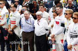 (L to R): Jean Todt (FRA) FIA President and Bernie Ecclestone (GBR) as the grid observes a minutes silence for World Day of Remembrance for Road Traffic Victims and the victims of the Paris terrorist attacks. 15.11.2015. Formula 1 World Championship, Rd 18, Brazilian Grand Prix, Sao Paulo, Brazil, Race Day.
