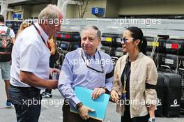 (L to R): Dr Helmut Marko (AUT) Red Bull Motorsport Consultant with Jean Todt (FRA) FIA President and his wife Michelle Yeoh (MAL). 15.11.2015. Formula 1 World Championship, Rd 18, Brazilian Grand Prix, Sao Paulo, Brazil, Race Day.