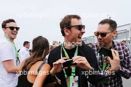 Michael Fassbender (IRE) Actor (Centre) with Bryan Singer (GBR) Film Director (Right) and Nicholas Hoult (GBR) (Left) Actor on the grid. 07.06.2015. Formula 1 World Championship, Rd 7, Canadian Grand Prix, Montreal, Canada, Race Day.