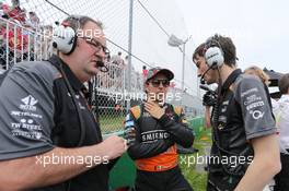 Sergio Perez (MEX) Sahara Force India F1 on the grid with Tom McCullough (GBR) Sahara Force India F1 Team Chief Engineer (Left) and Tim Wright (GBR) Sahara Force India F1 Team Race Engineer (Right). 07.06.2015. Formula 1 World Championship, Rd 7, Canadian Grand Prix, Montreal, Canada, Race Day.