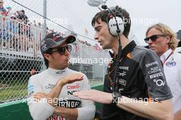 Sergio Perez (MEX) Sahara Force India F1 with Tim Wright (GBR) Sahara Force India F1 Team Race Engineer on the grid. 07.06.2015. Formula 1 World Championship, Rd 7, Canadian Grand Prix, Montreal, Canada, Race Day.