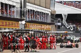 Sebastian Vettel (GER) Ferrari SF15-T makes a pit stop. 07.06.2015. Formula 1 World Championship, Rd 7, Canadian Grand Prix, Montreal, Canada, Race Day.