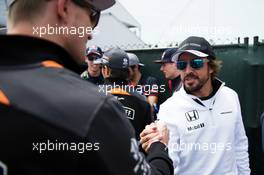 Fernando Alonso (ESP) McLaren with Nico Hulkenberg (GER) Sahara Force India F1 on the drivers parade. 07.06.2015. Formula 1 World Championship, Rd 7, Canadian Grand Prix, Montreal, Canada, Race Day.