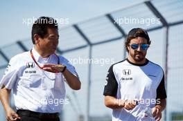 (L to R): Yasuhisa Arai (JPN) Honda Motorsport Chief Officer walks the circuit with Fernando Alonso (ESP) McLaren. 04.06.2015. Formula 1 World Championship, Rd 7, Canadian Grand Prix, Montreal, Canada, Preparation Day.