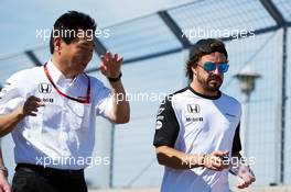 (L to R): Yasuhisa Arai (JPN) Honda Motorsport Chief Officer walks the circuit with Fernando Alonso (ESP) McLaren. 04.06.2015. Formula 1 World Championship, Rd 7, Canadian Grand Prix, Montreal, Canada, Preparation Day.