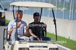 Lewis Hamilton (GBR) Mercedes AMG F1 drives the circuit with David Coulthard (GBR) Red Bull Racing and Scuderia Toro Advisor / BBC Television Commentator. 04.06.2015. Formula 1 World Championship, Rd 7, Canadian Grand Prix, Montreal, Canada, Preparation Day.