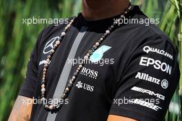 The necklace worn by Lewis Hamilton (GBR) Mercedes AMG F1. 04.06.2015. Formula 1 World Championship, Rd 7, Canadian Grand Prix, Montreal, Canada, Preparation Day.