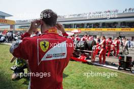 Sebastian Vettel (GER) Ferrari on the grid. 12.04.2015. Formula 1 World Championship, Rd 3, Chinese Grand Prix, Shanghai, China, Race Day.