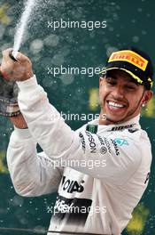 Race winner Lewis Hamilton (GBR) Mercedes AMG F1 celebrates with the champagne on the podium. 12.04.2015. Formula 1 World Championship, Rd 3, Chinese Grand Prix, Shanghai, China, Race Day.