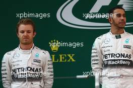 2nd place Nico Rosberg (GER) Mercedes AMG F1 with 1st place Lewis Hamilton (GBR) Mercedes AMG F1. 12.04.2015. Formula 1 World Championship, Rd 3, Chinese Grand Prix, Shanghai, China, Race Day.