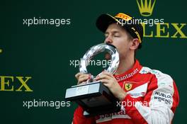 Sebastian Vettel (GER) Ferrari celebrates his third position on the podium. 12.04.2015. Formula 1 World Championship, Rd 3, Chinese Grand Prix, Shanghai, China, Race Day.