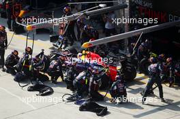 Daniel Ricciardo (AUS) Red Bull Racing RB11 makes a pit stop. 12.04.2015. Formula 1 World Championship, Rd 3, Chinese Grand Prix, Shanghai, China, Race Day.