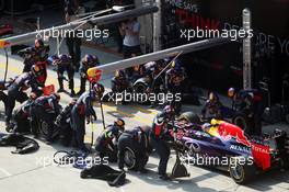 Daniel Ricciardo (AUS) Red Bull Racing RB11 makes a pit stop. 12.04.2015. Formula 1 World Championship, Rd 3, Chinese Grand Prix, Shanghai, China, Race Day.