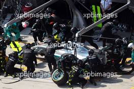 Lewis Hamilton (GBR) Mercedes AMG F1 W06 makes a pit stop. 12.04.2015. Formula 1 World Championship, Rd 3, Chinese Grand Prix, Shanghai, China, Race Day.