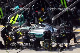 Nico Rosberg (GER) Mercedes AMG F1 W06 makes a pit stop. 12.04.2015. Formula 1 World Championship, Rd 3, Chinese Grand Prix, Shanghai, China, Race Day.