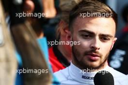 Will Stevens (GBR) Manor Marussia F1 Team with the media. 11.04.2015. Formula 1 World Championship, Rd 3, Chinese Grand Prix, Shanghai, China, Qualifying Day.