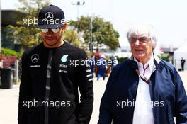 (L to R): Lewis Hamilton (GBR) Mercedes AMG F1 with Bernie Ecclestone (GBR). 11.04.2015. Formula 1 World Championship, Rd 3, Chinese Grand Prix, Shanghai, China, Qualifying Day.