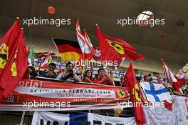 Fans and banners in the grandstand. 12.04.2015. Formula 1 World Championship, Rd 3, Chinese Grand Prix, Shanghai, China, Race Day.
