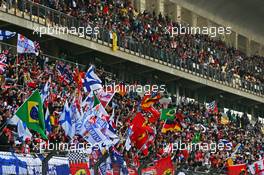Fans in the grandstand. 12.04.2015. Formula 1 World Championship, Rd 3, Chinese Grand Prix, Shanghai, China, Race Day.