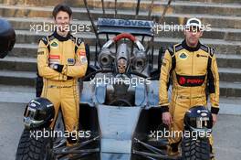(L to R): Romain Grosjean (FRA) Lotus F1 Team and team mate Pastor Maldonado (VEN) Lotus F1 Team with special race overalls and car livery to promote the film Mad Max: Fury Road. 08.05.2015. Formula 1 World Championship, Rd 5, Spanish Grand Prix, Barcelona, Spain, Practice Day.