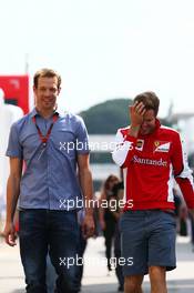 (L to R): Alex Wurz (AUT) Williams Driver Mentor with Sebastian Vettel (GER) Ferrari. 08.05.2015. Formula 1 World Championship, Rd 5, Spanish Grand Prix, Barcelona, Spain, Practice Day.