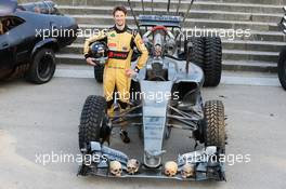 Romain Grosjean (FRA) Lotus F1 Team with special race overalls and car livery to promote the film Mad Max: Fury Road. 08.05.2015. Formula 1 World Championship, Rd 5, Spanish Grand Prix, Barcelona, Spain, Practice Day.