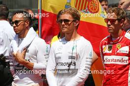 (L to R): Lewis Hamilton (GBR) Mercedes AMG F1 with Nico Rosberg (GER) Mercedes AMG F1 and Sebastian Vettel (GER) Ferrari on the grid. 10.05.2015. Formula 1 World Championship, Rd 5, Spanish Grand Prix, Barcelona, Spain, Race Day.