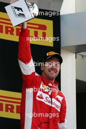 Sebastian Vettel (GER) Ferrari celebrates his third position on the podium. 10.05.2015. Formula 1 World Championship, Rd 5, Spanish Grand Prix, Barcelona, Spain, Race Day.