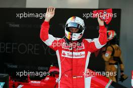 Sebastian Vettel (GER) Ferrari celebrates his third position in parc ferme. 10.05.2015. Formula 1 World Championship, Rd 5, Spanish Grand Prix, Barcelona, Spain, Race Day.