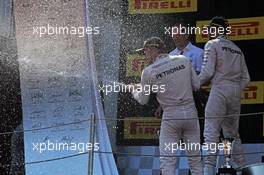 Race winner Nico Rosberg (GER) Mercedes AMG F1 celebrates with the champagne on the podium. 10.05.2015. Formula 1 World Championship, Rd 5, Spanish Grand Prix, Barcelona, Spain, Race Day.