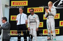 The podium (L to R): Tony Ross (GBR) Mercedes AMG F1 Race Engineer; second placed Lewis Hamilton (GBR) Mercedes AMG F1; race winner Nico Rosberg (GER) Mercedes AMG F1. 10.05.2015. Formula 1 World Championship, Rd 5, Spanish Grand Prix, Barcelona, Spain, Race Day.