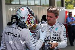 (L to R): Lewis Hamilton (GBR) Mercedes AMG F1 congratulates race winner and team mate Nico Rosberg (GER) Mercedes AMG F1. 10.05.2015. Formula 1 World Championship, Rd 5, Spanish Grand Prix, Barcelona, Spain, Race Day.
